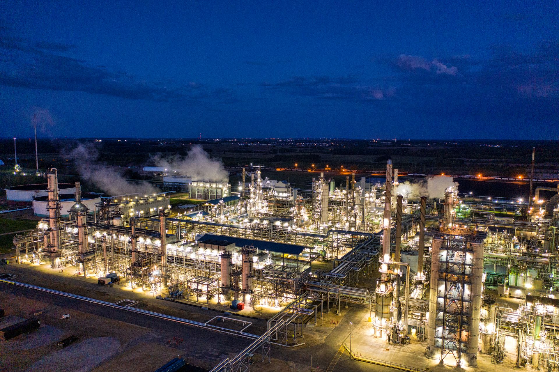 Industrial facility at night, aerial view